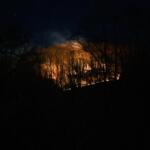 Firefighters had a wildfire burning off Lytle Cove Road about 70% contained by early Friday morning, according to Swannanoa Fire & Rescue.