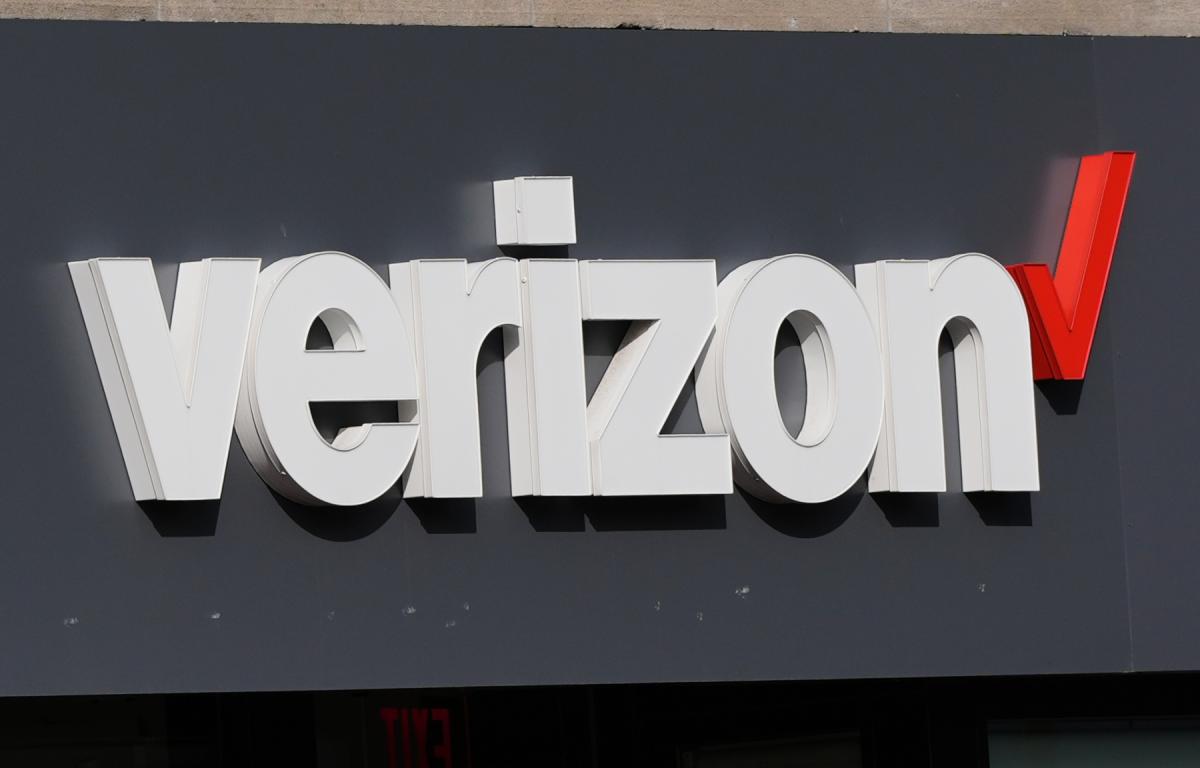 FILE - A Verizon sign is displayed on a store, Sept. 30, 2025, in Cambridge, Mass. (AP Photo/Charles Krupa, File)