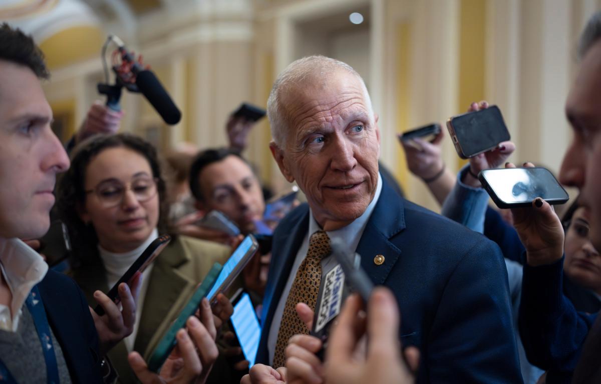 Sen. Thom Tillis, R-N.C., speaks with reporters following a closed-door meeting with fellow Republicans on spending legislation that funds the Department of Homeland Security and a swath of other government agencies, at the Capitol in Washington, Wednesday, Jan. 28, 2026. (AP Photo/J. Scott Applewhite)