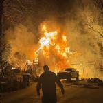 A late-night house fire in Fairview destroyed a home and spread into nearby woods, Fairview Volunteer Fire Department officials said.