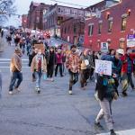 Protesters march through downtown Asheville, N.C., on Wednesday, Jan. 8, during a demonstration opposing U.S. Immigration and Customs Enforcement (ICE), following reports of a fatal shooting involving an ICE agent in Minneapolis. (Photo credit: James Burns)