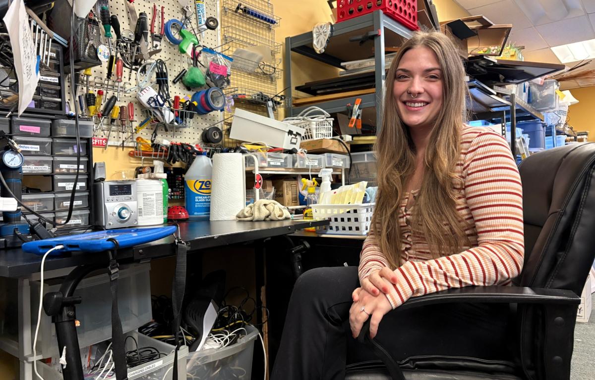 Lily Korpella leads intake at Asheville Humane Thrift Store while pursuing her love of nature, family, and scuba diving