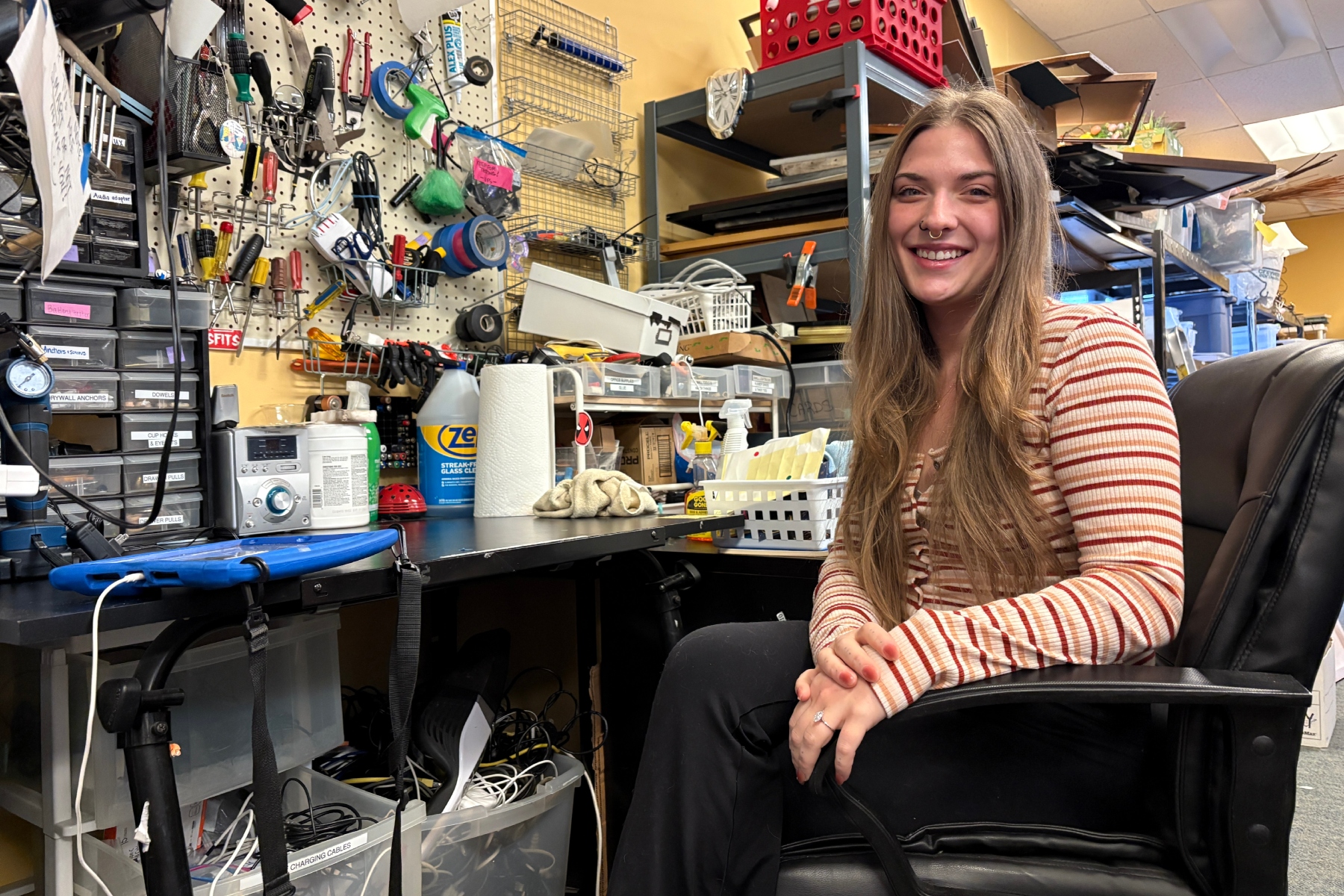 Lily Korpella leads intake at Asheville Humane Thrift Store while pursuing her love of nature, family, and scuba diving