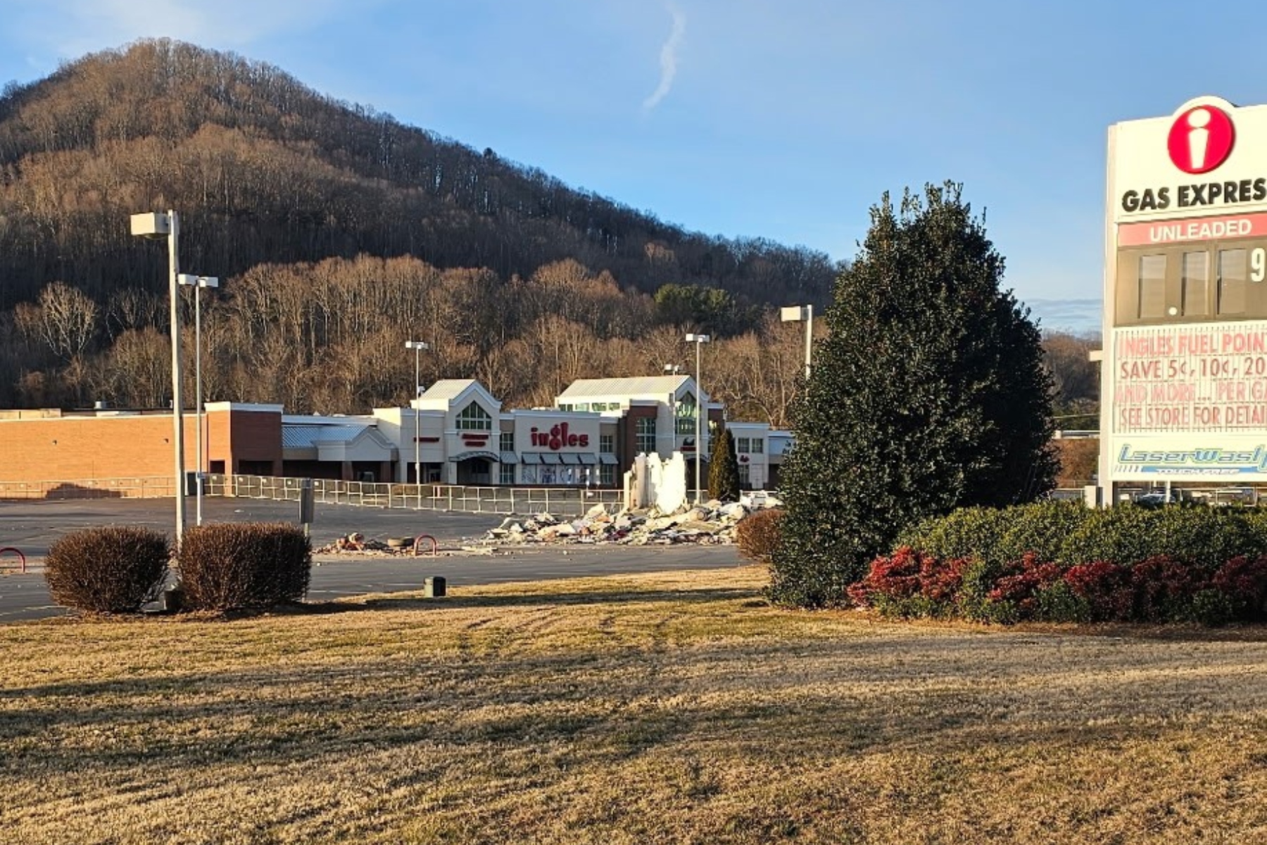 Demolition is underway at the former Ingles Markets site in Swannanoa, where damaged buildings are being torn down months after Tropical Storm Helene flooded the property and forced the grocery store’s permanent closure.
