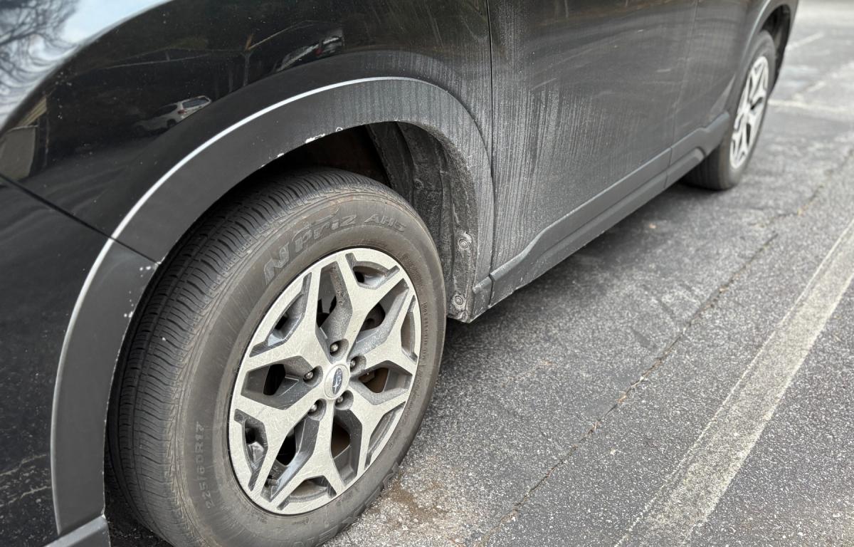 A drive around Asheville shows the toll recent storms have taken -- vehicles coated in salt and sand