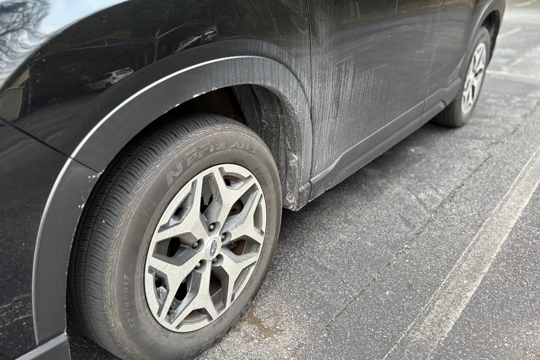 A drive around Asheville shows the toll recent storms have taken -- vehicles coated in salt and sand