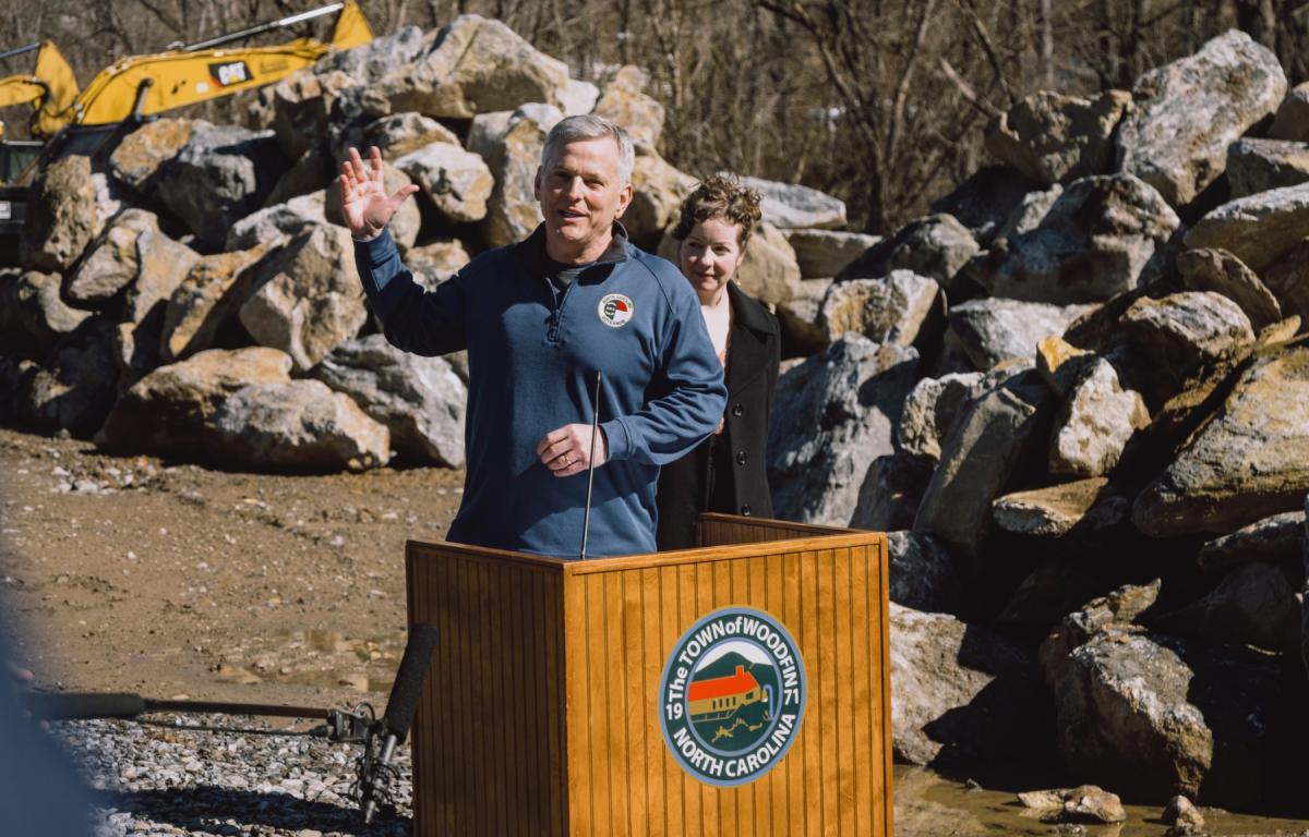 Gov. Josh Stein was in Woodfin on Monday to announce $5.7 million in state grants for eight flood resilience projects in the French Broad River Basin.