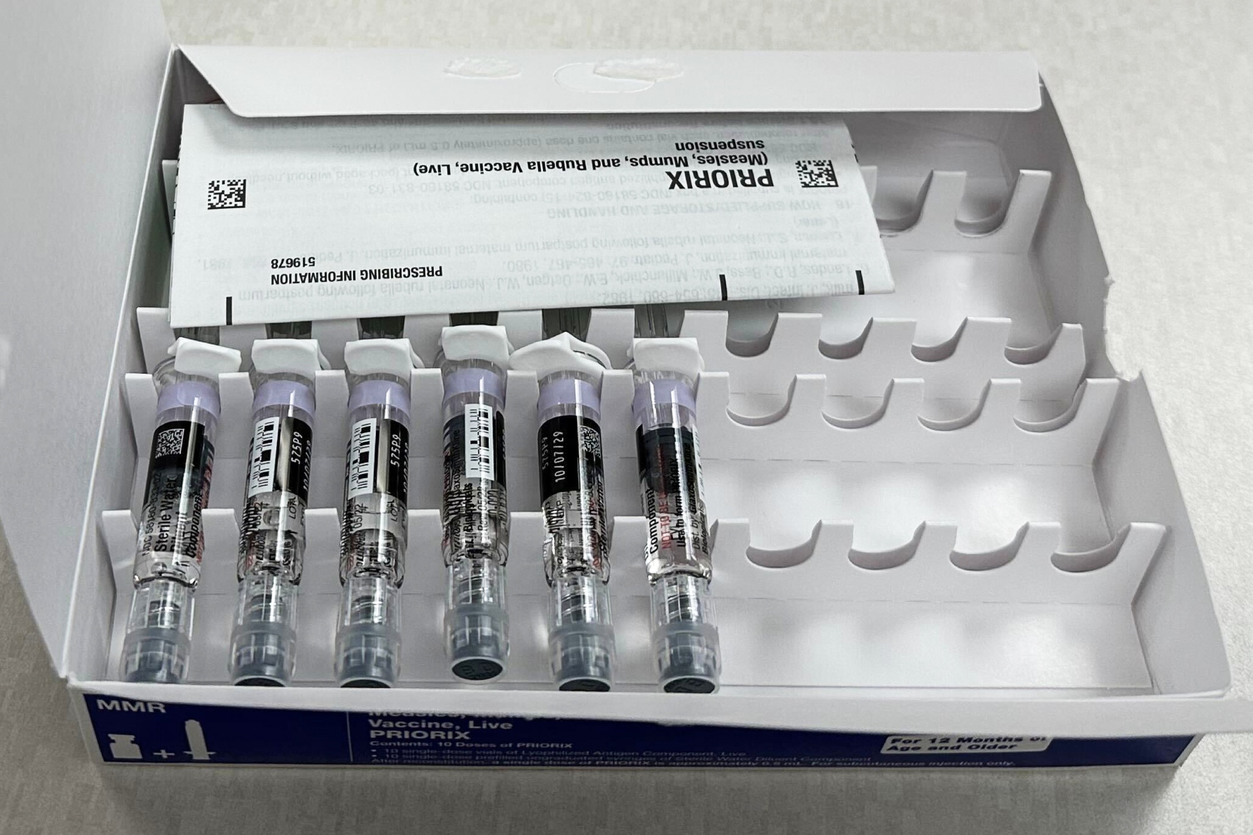 Priorix measles, mumps and rubella vaccines are prepared at Children's Minnesota on Nov. 20, 2025, in Minneapolis. (AP Photo/Devi Shastri)