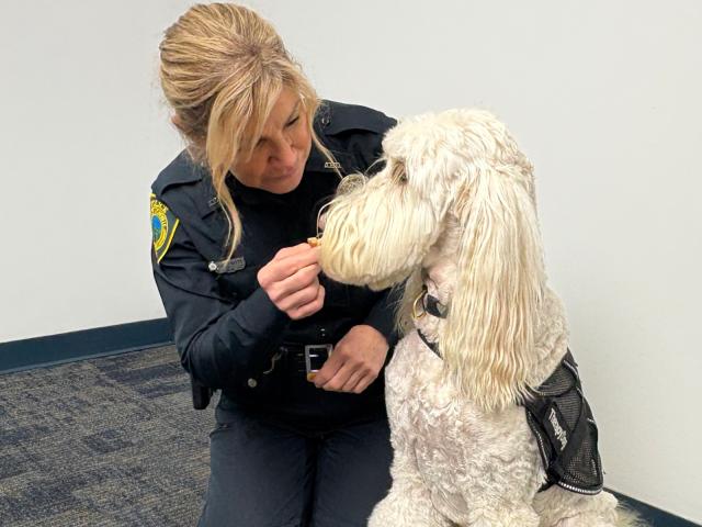 Asheville Senior Police Officer Debbie LeCroy and Officer Cora