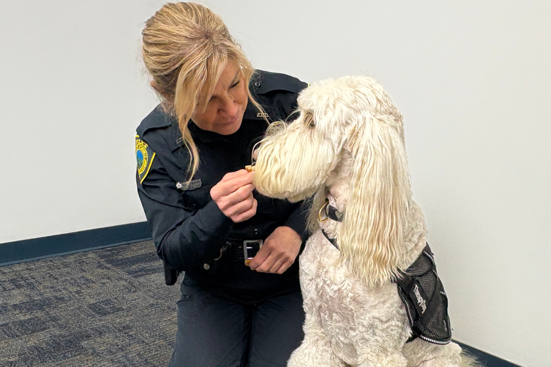 Asheville Senior Police Officer Debbie LeCroy and Officer Cora