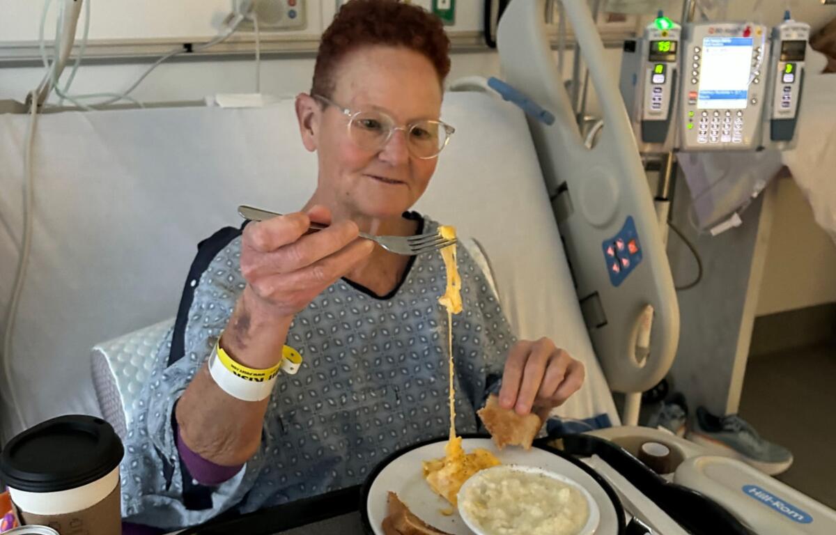 After a mostly vegan diet before her kidney transplant, Deb Love enjoys cheese, something she had not had in the time leading up to her surgery.