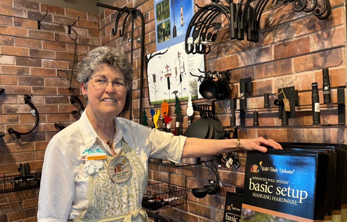 At Wild Birds Unlimited, Martha Rollefson helps customers choose feeders, seed and strategies to attract birds.