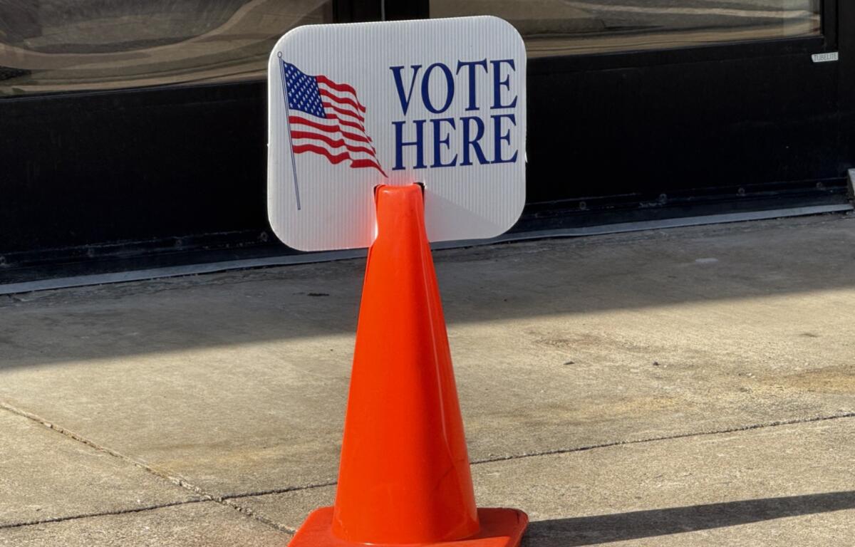 Vote here election sign