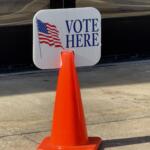 Vote here election sign