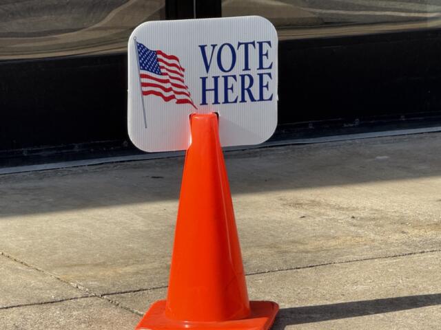 Vote here election sign