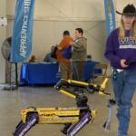 Western Carolina University student Tanner Drum demonstrated a robotic dog used on job sites. The Boston Dynamics “Spot” robot -- nicknamed “Catabox” -- can perform automated site walks, capture images, scan environments using lidar and generate 3D models.