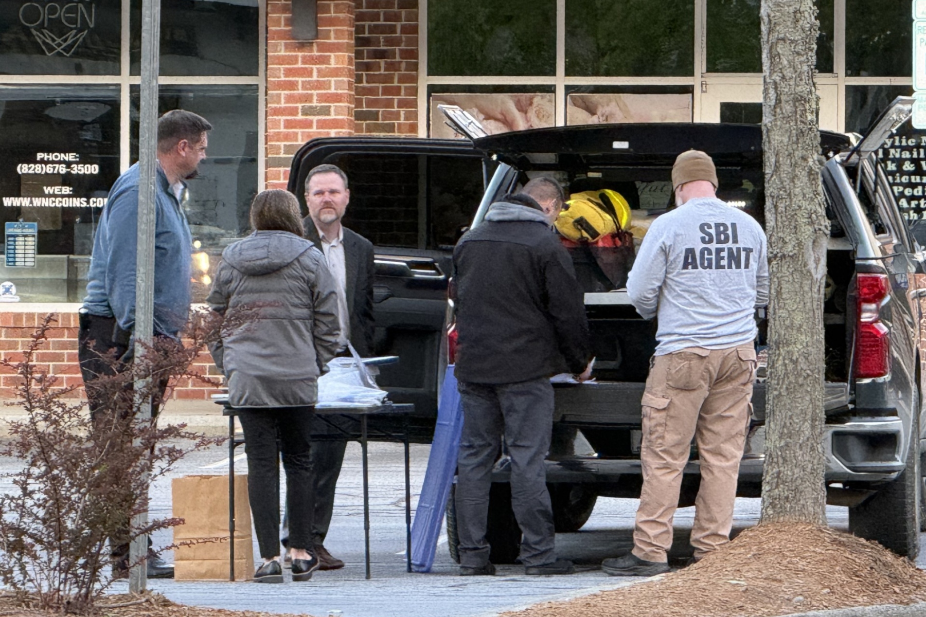 The North Carolina State Bureau of Investigation is at the scene of a shooting that left a suspect dead and an Asheville police officer injured.