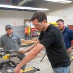Andrew Lunceford, a recent Level Up: Core Construction graduate, operates a saw in Blue Ridge Community College's Spearman Building. (Photo credit: Blue Ridge Community College/Benjamin Rickert)