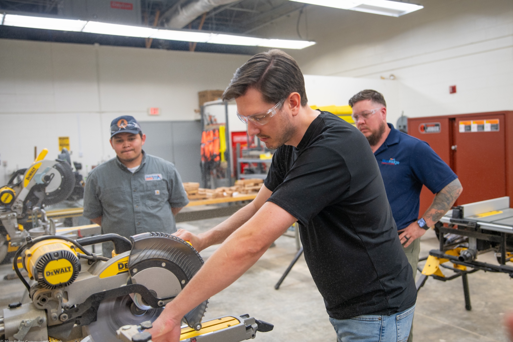 Andrew Lunceford, a recent Level Up: Core Construction graduate, operates a saw in Blue Ridge Community College's Spearman Building. (Photo credit: Blue Ridge Community College/Benjamin Rickert)
