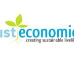 Just Economics logo featuring a green sprout and the tagline creating sustainable livelihoods.