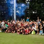 Asheville City Soccer Club celebrates after the Blues' 3-0 victory over Port City FC on Saturday at Greenwood Field.
