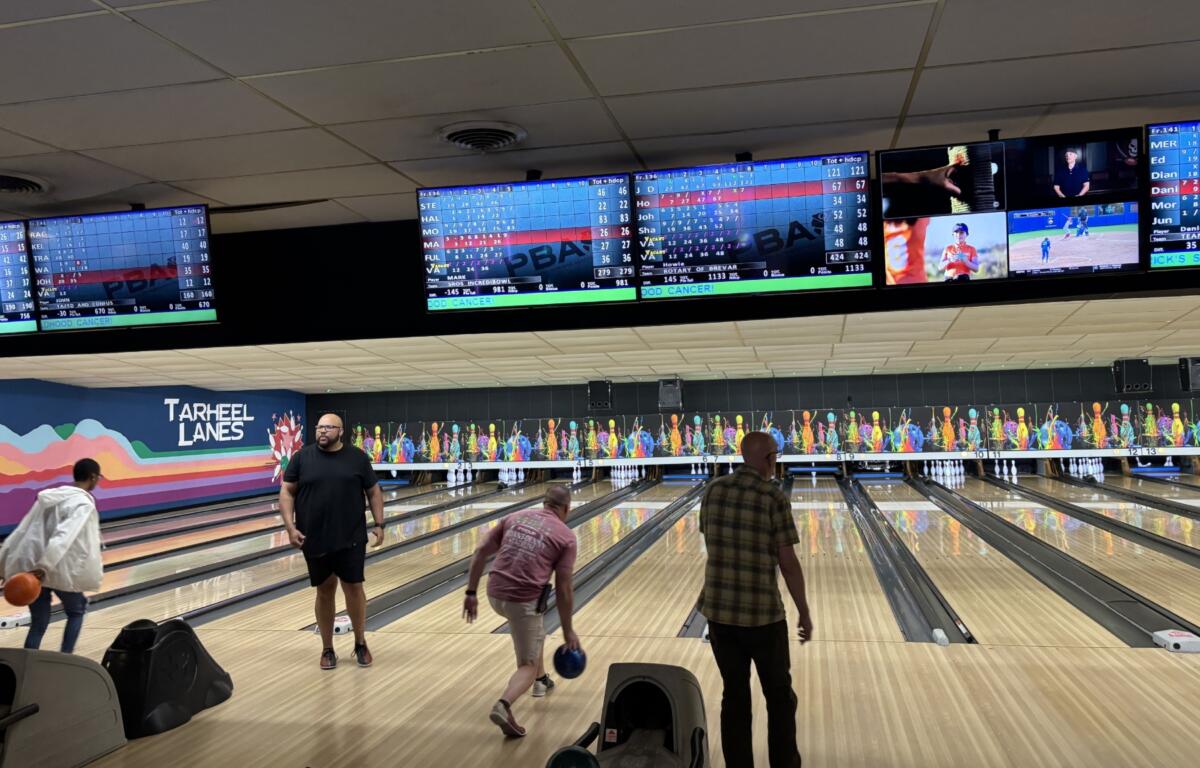 Participants bowl during the 10th annual Strikeout Childhood Cancer fundraiser at Tarheel Lanes in Hendersonville on May 28.