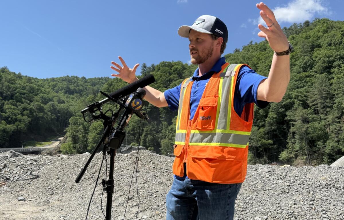 NCDOT Resident Engineer Blake Soblesky speaks with reporters at the Interstate 40 reconstruction site in the Pigeon River Gorge on Wednesday.