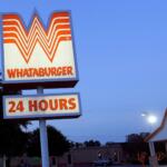 This Thursday, July 9, 2015 photo shows a Whataburger restaurant in San Antonio, Texas. The iconic Texas restaurant chain will not allow the open carrying of guns on its properties, taking a stand against a new law legalizing the practice. (AP Photo/Eric Gay)
