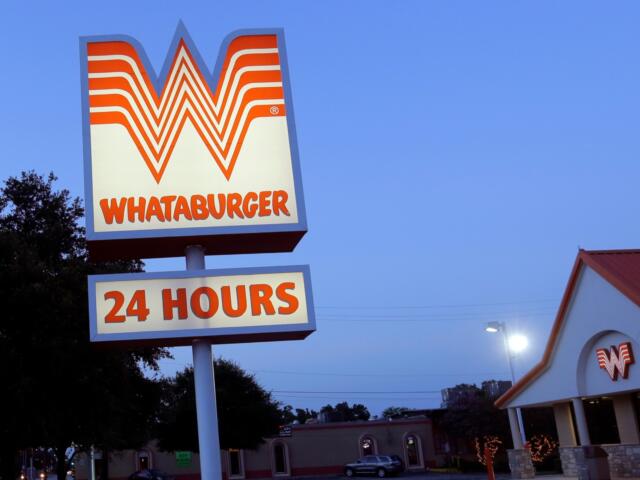 This Thursday, July 9, 2015 photo shows a Whataburger restaurant in San Antonio, Texas. The iconic Texas restaurant chain will not allow the open carrying of guns on its properties, taking a stand against a new law legalizing the practice. (AP Photo/Eric Gay)