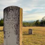 image of government issued headstone in a cemetery in the mountains of western north carolina