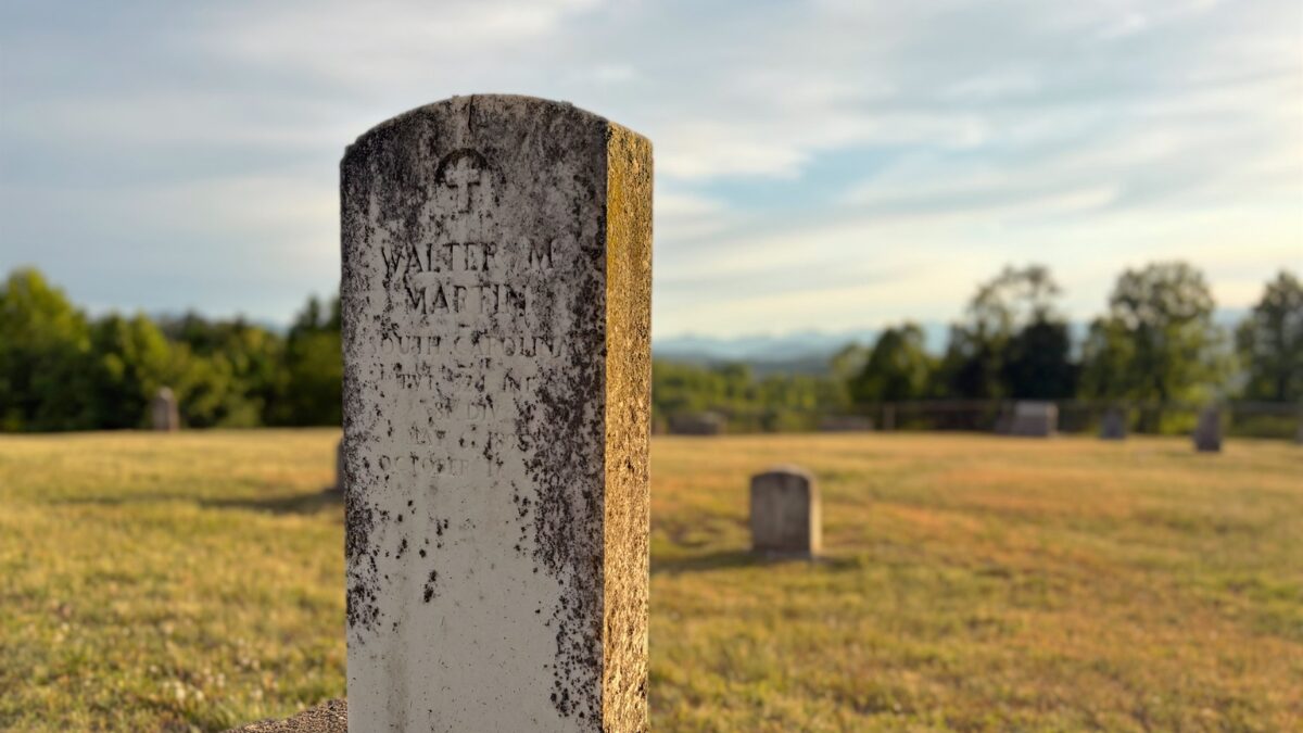 image of government issued headstone in a cemetery in the mountains of western north carolina