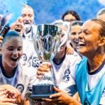 Asheville City SC players celebrate after clinching the South Central Division title with a 2-1 victory over Birmingham Legion WFC, earning a berth in the USL W League playoffs.