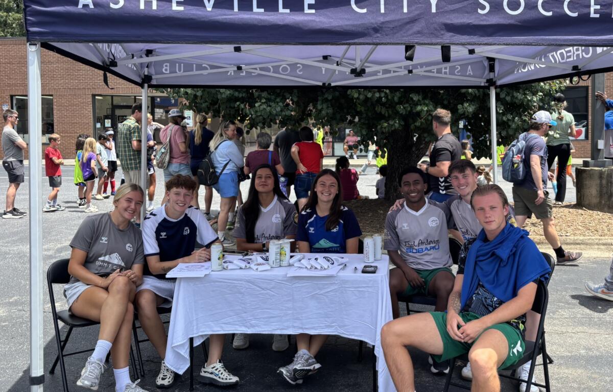 Families, soccer players and community members gathered during Asheville City Soccer Club's community partnership event Saturday in Asheville.