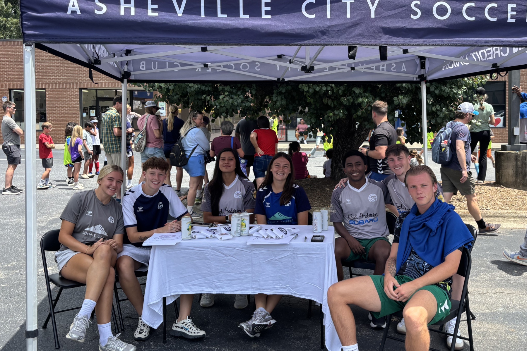 Families, soccer players and community members gathered during Asheville City Soccer Club's community partnership event Saturday in Asheville.