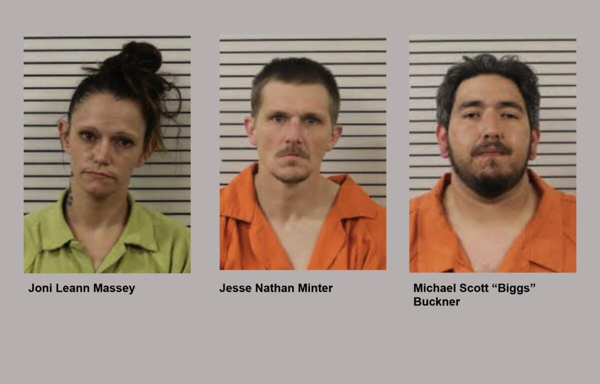 Mugshot lineup: three individuals in front of a height chart wearing jail uniforms (left in green, center in orange, right in orange).
