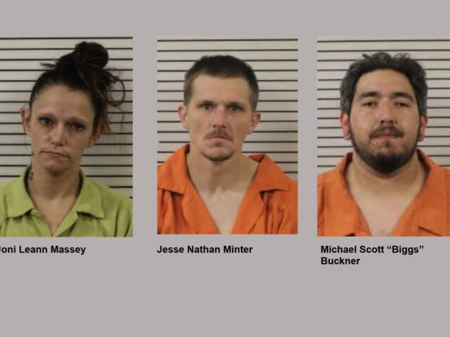Mugshot lineup: three individuals in front of a height chart wearing jail uniforms (left in green, center in orange, right in orange).