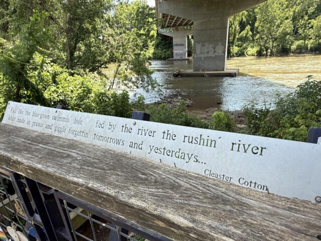 The French Broad River flowing through Asheville's River Arts District.