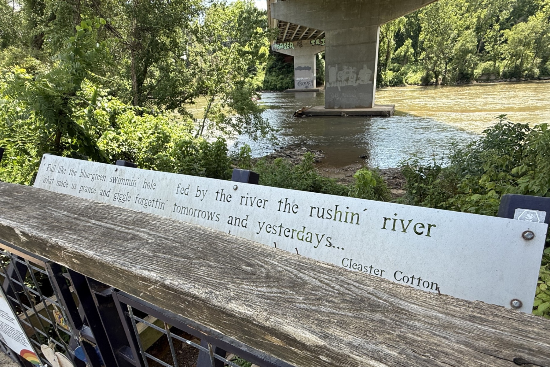The French Broad River flowing through Asheville's River Arts District.
