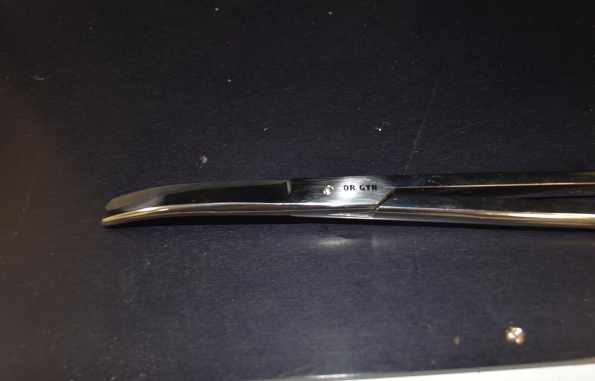 A laser-etched surgical instrument displays a permanent department identifier and QR code at the Charles George Department of Veterans Affairs Medical Center in Asheville. (Photo credit: Charles George Department of Veterans Affairs Medical Center)