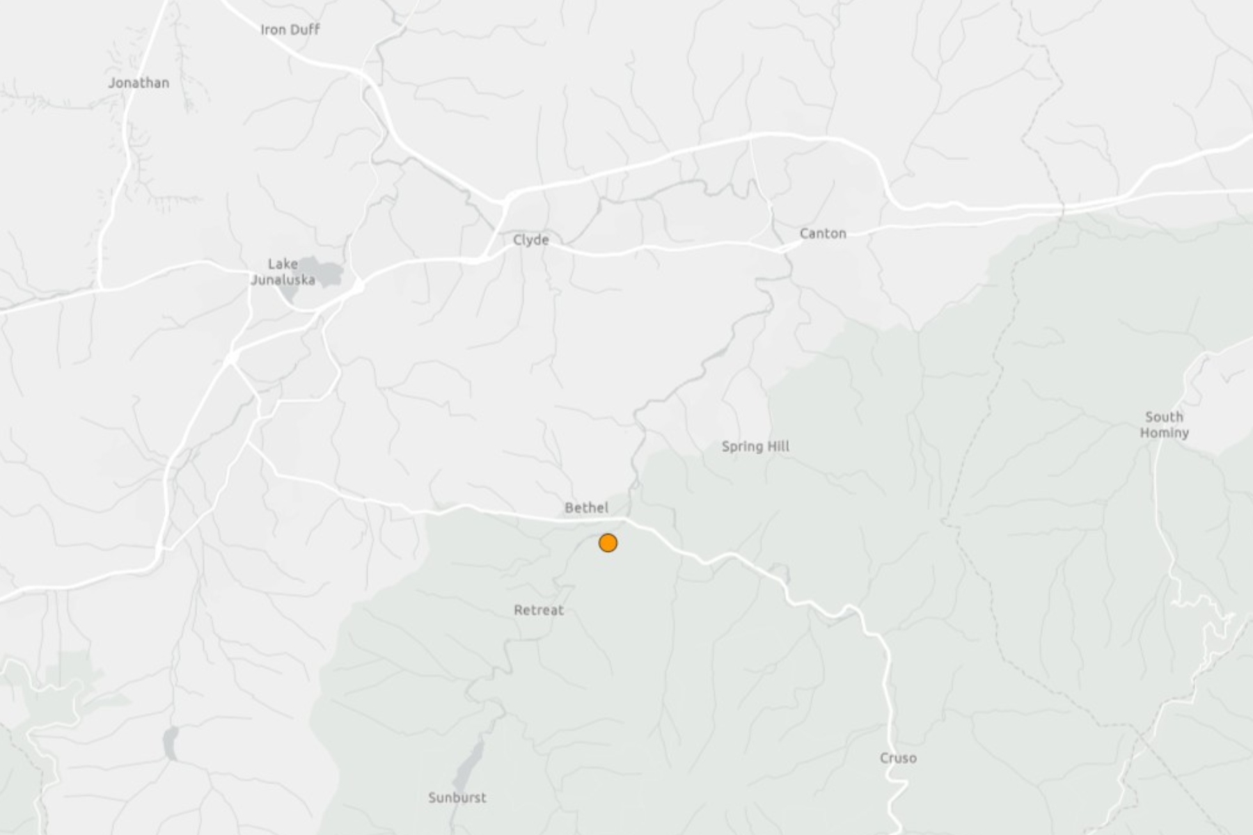 Map snippet showing roads and towns (Clyde, Canton, Bethel, Retreat, Lake Junaluska) with an orange location pin south of Bethel.