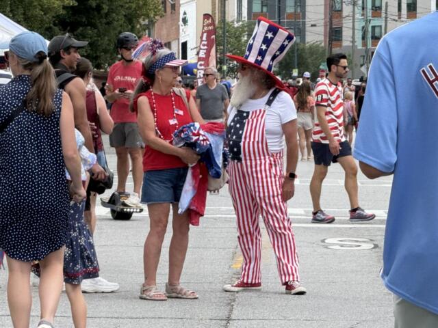 People gather in Asheville's South Slope on Saturday, July 4, 2026, to celebrate Independence Day