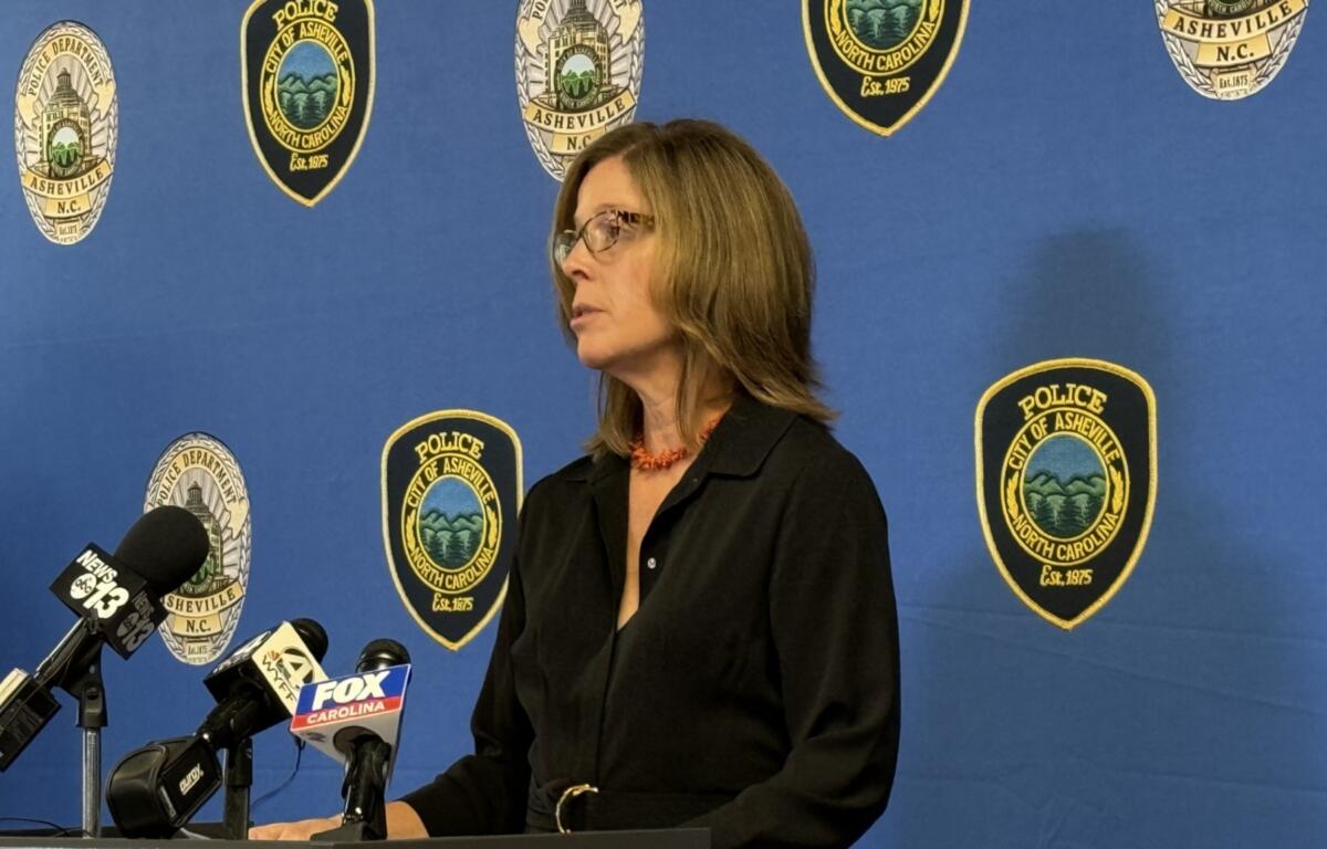 Asheville Mayor Esther Manheimer addresses reporters during a news conference on the Biltmore Avenue mass shooting, expressing condolences to the victims' families and pledging the city's continued support for the investigation and efforts to reduce gun violence.