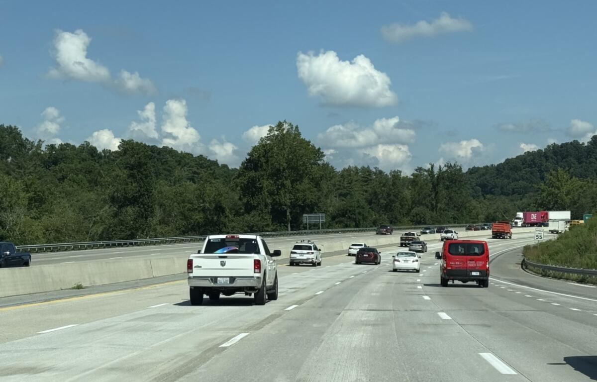 Traffic moves through the newly opened four-lane westbound section of Interstate 26 near the Lomng Shoals Road exit on Friday, marking a major milestone in the N.C. Department of Transportation's I-26 widening project.