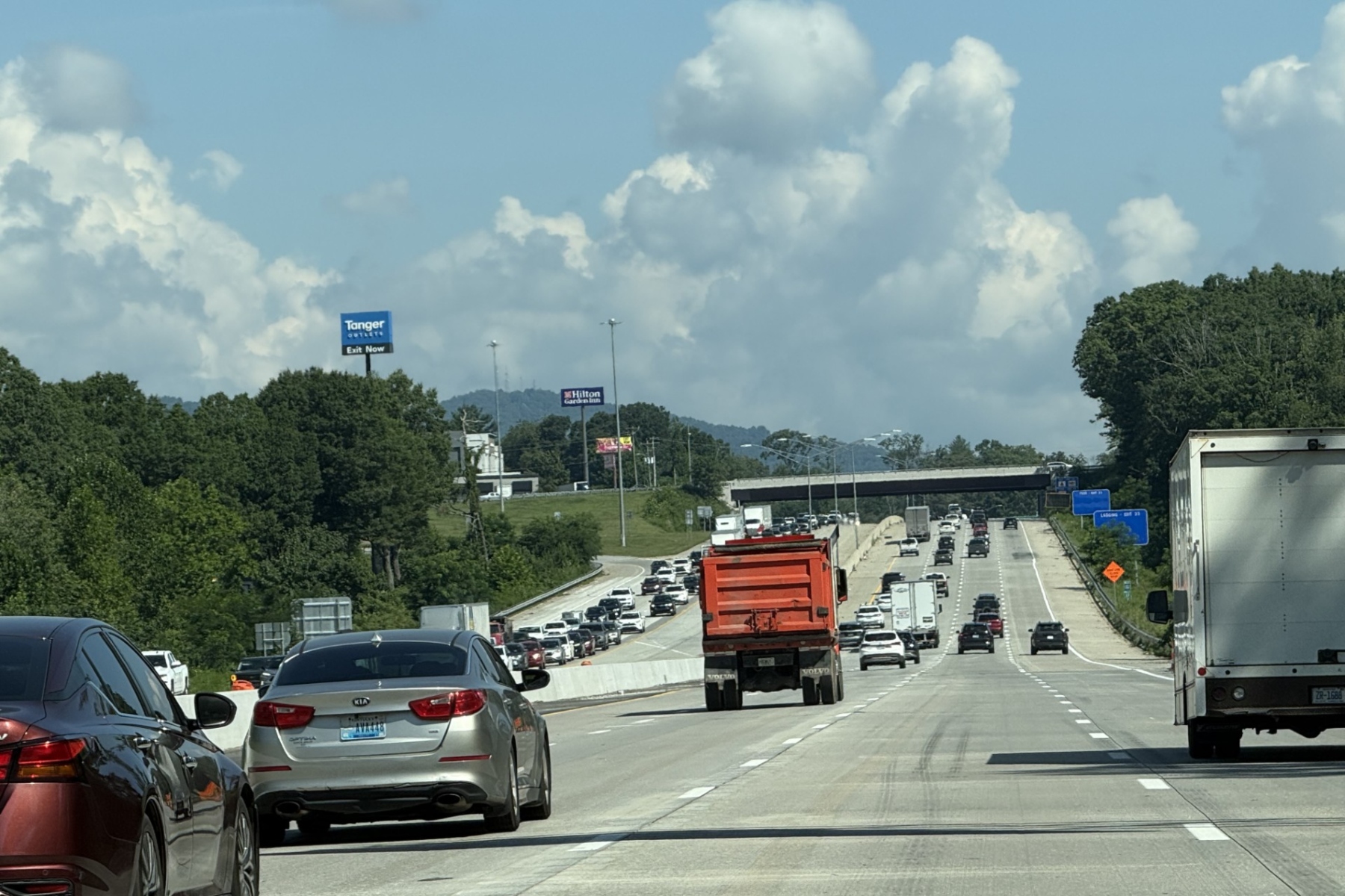Traffic moves through the newly opened four-lane westbound section of Interstate 26 near the Brevard Road exit on Friday, marking a major milestone in the N.C. Department of Transportation's I-26 widening project.