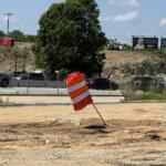 NCDOT crews continue clearing land along the Interstate 26 Connector corridor in Asheville as construction ramps up on the multibillion-dollar highway project.