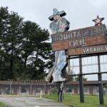 The fenced-off Mountaineer Inn property at 155 Tunnel Road sits vacant in Asheville. City planning records show a preliminary proposal for a Sheetz convenience store and gas station at the longtime motel site, though the project remains in the early review process.