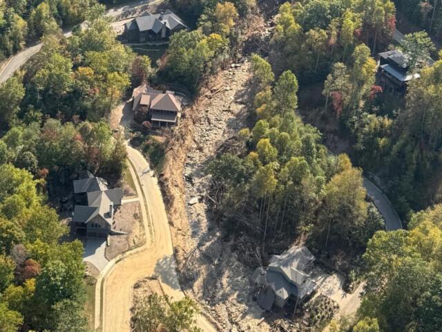Oblique aerial view of a landslide near Black Mountain, North Carolina triggered by intense rainfall during Hurricane Helene in fall 2024. The photograph was collected during a U.S. Geological Survey aerial reconnaissance flight documenting widespread landsliding and flooding associated with the storm.