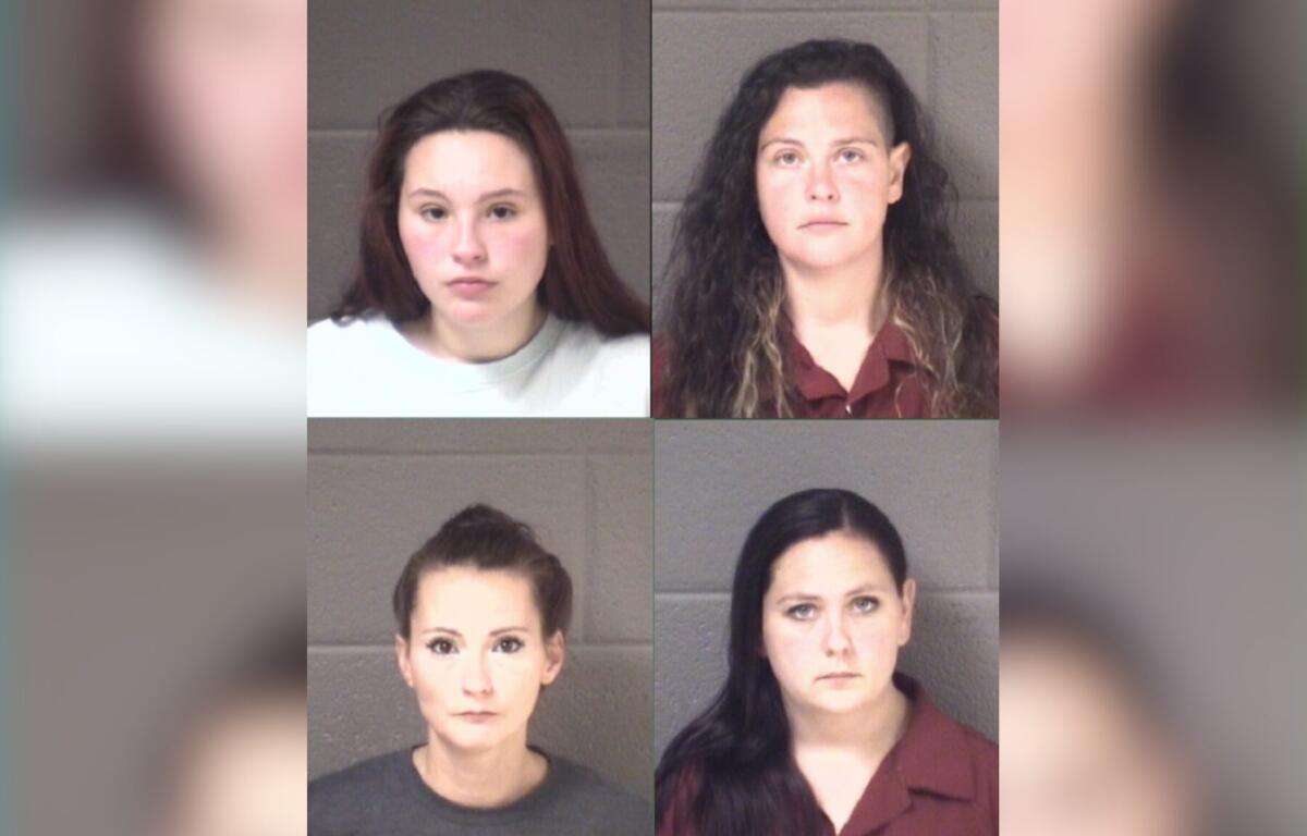 Mugshot collage of four women posed against gray cinderblock walls; two in maroon uniforms (top-right and bottom-right) and two in casual tops (top-left white shirt, bottom-left gray shirt).