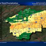 Map showing Storm Total Precipitation forecast for the Greenville-Spartanburg area (Jul 22–25), with green to yellow to orange regions indicating increasing rainfall (roughly 0.5–3+ inches) and city labels along major highways like I-40 and I-85.