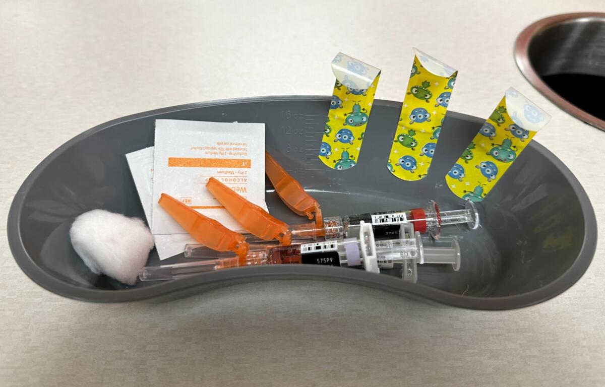 Measles, mumps and rubella vaccines are prepared at Children's Minnesota on Nov. 20, 2025, in Minneapolis. (AP Photo/Devi Shastri)